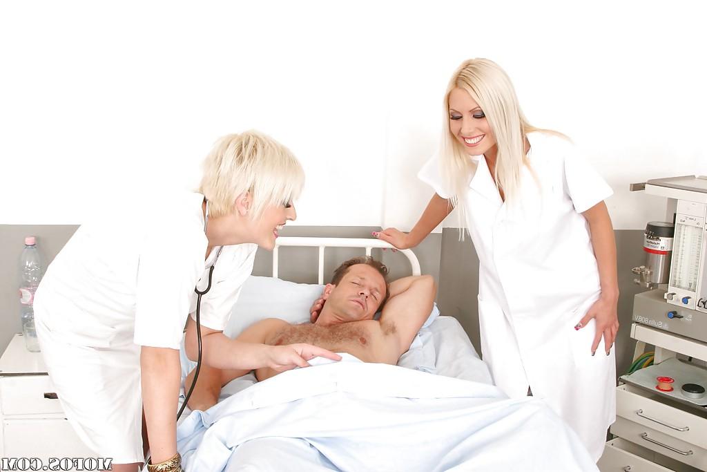 16P Seductive blonde nurses in nylon stockings sharing a hard boner