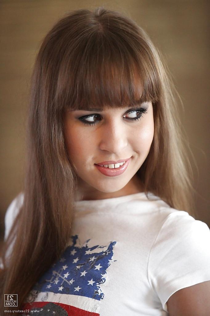 16P Graceful european babe on high heels slipping off her clothes