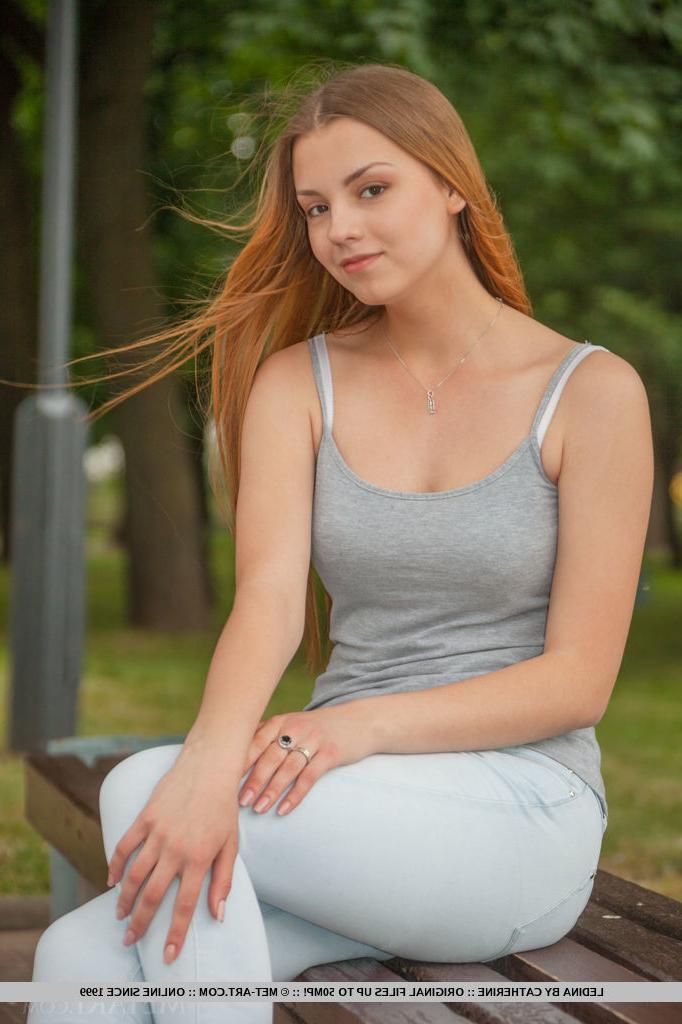 18P Redhead European babe undressing to bare tiny teen tits during glam shoot