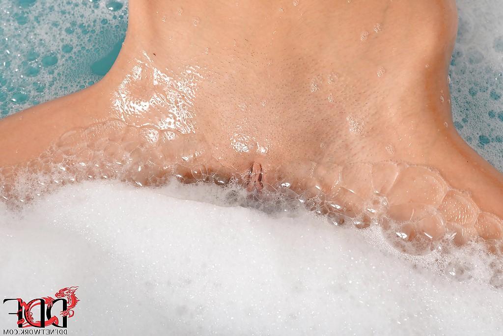 16P Skinny european teen taking foamy bath and masturbating her tight pussy