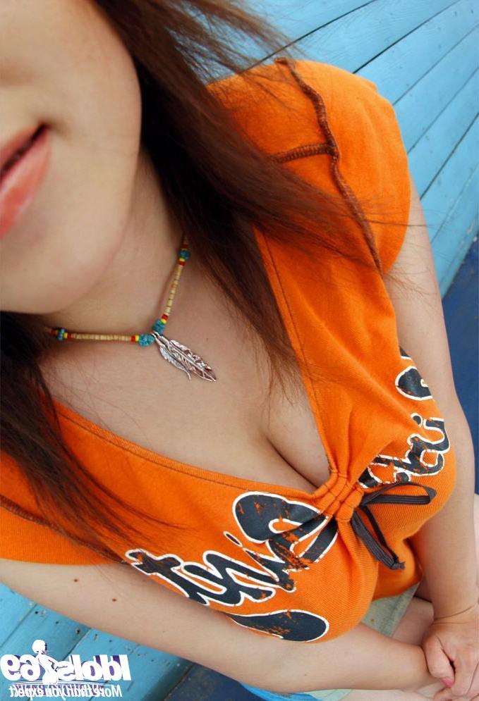 16P Nasty asian lassie in miniskirt revealing her big natural tits