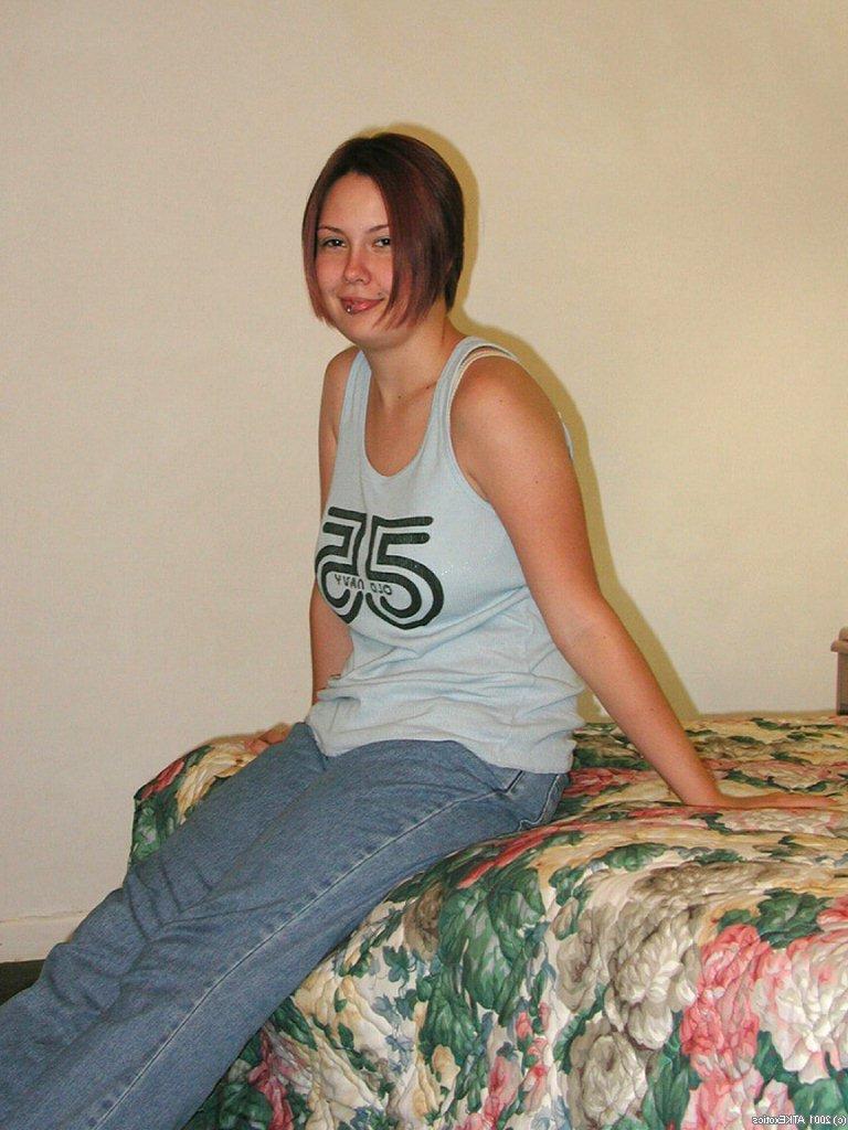 16P Amateur Latina Gwen displaying tattoos and big natural tits after undressing