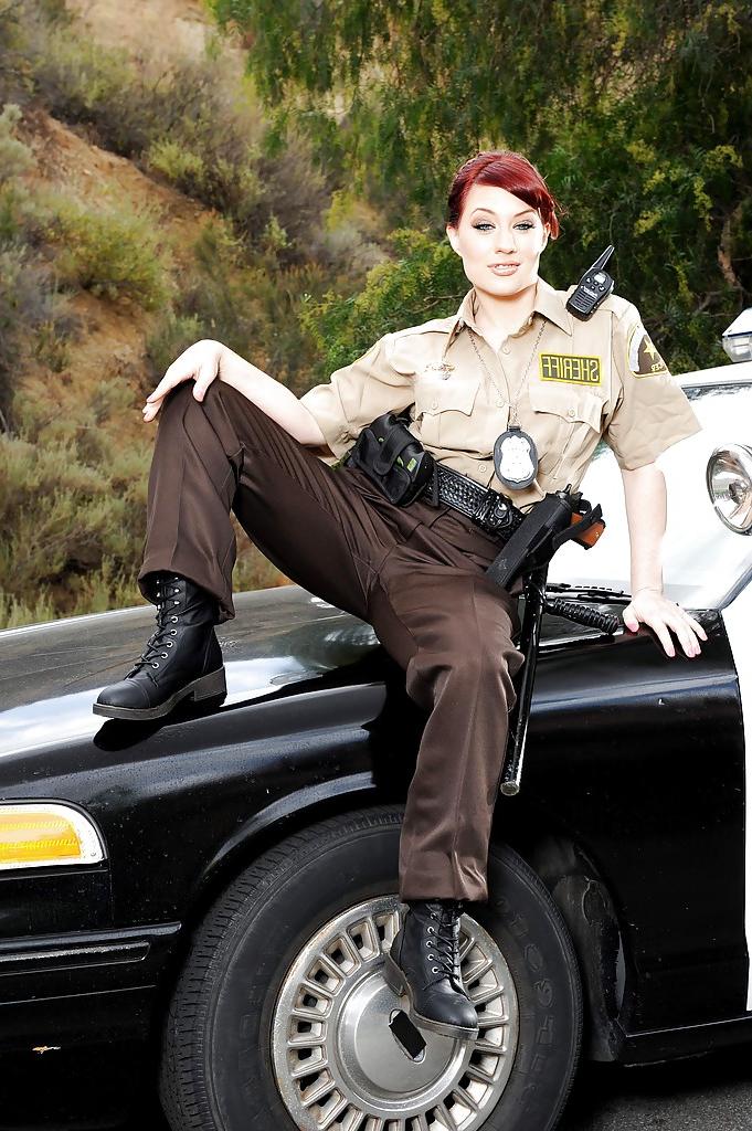 12P Redheaded pornstar Jessica Ryan gives interracial bj outside in cop uniform
