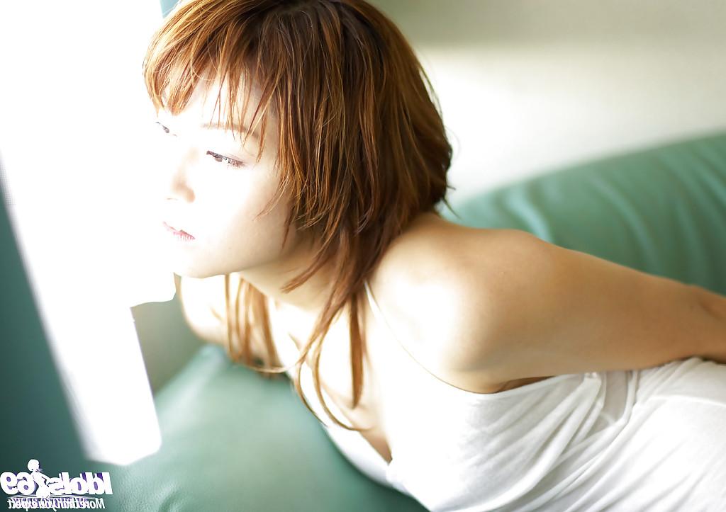 15P Submissive asian babe Karen Kisaragi posing barely clothed