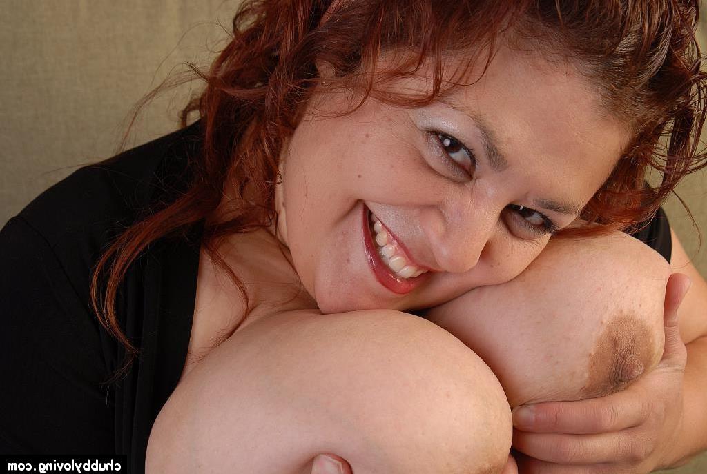 16P Fatty mature brunette Reyna undressing and demonstrating her tits