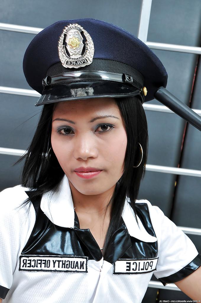 16P Brunette Latina babe Rose looking sexy half naked in police uniform