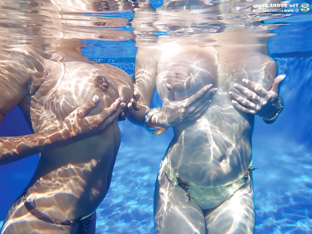 16P Underwater shots of big titted cuties and their lovely shaved snatches
