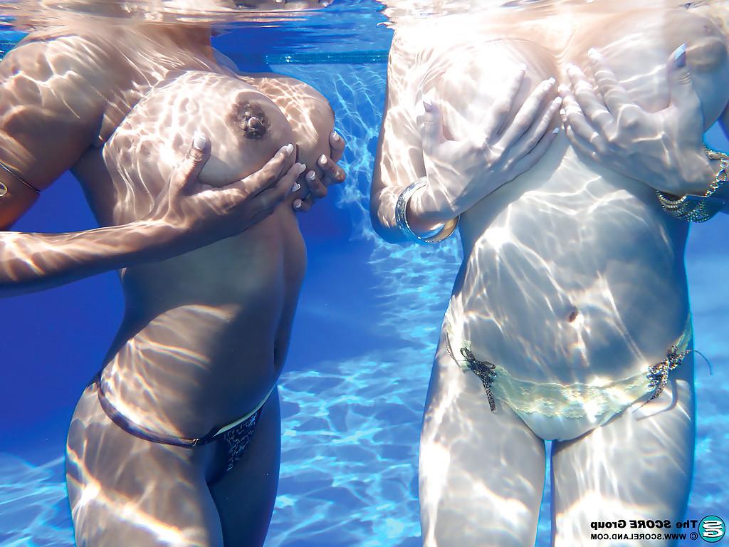 16P Underwater shots of big titted cuties and their lovely shaved snatches