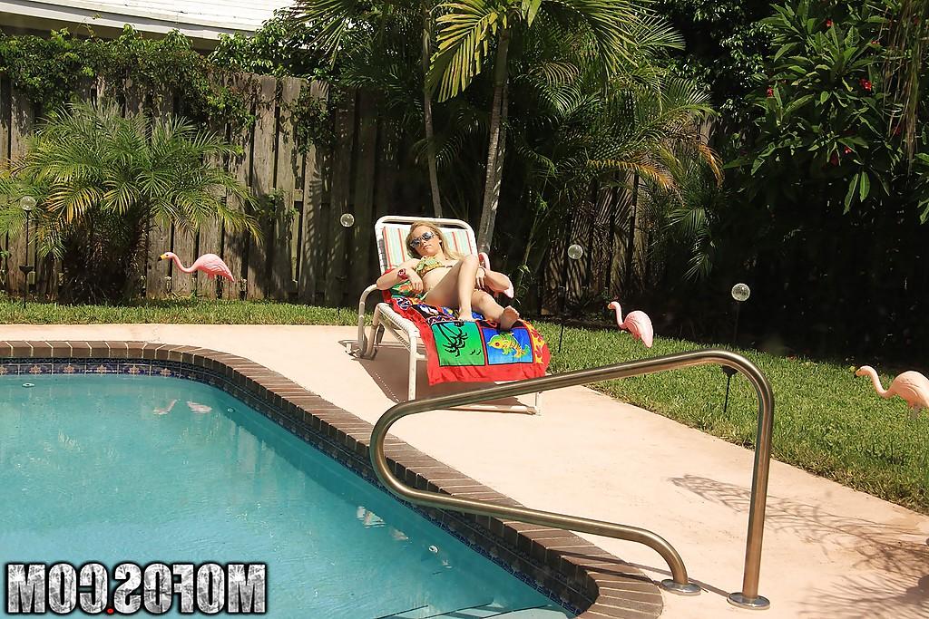 16P Pretty amateur babe Madison Chandler stripping by the pool
