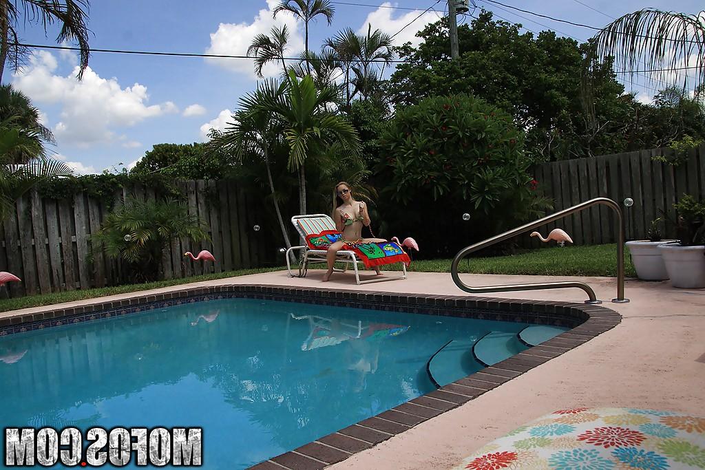 16P Pretty amateur babe Madison Chandler stripping by the pool