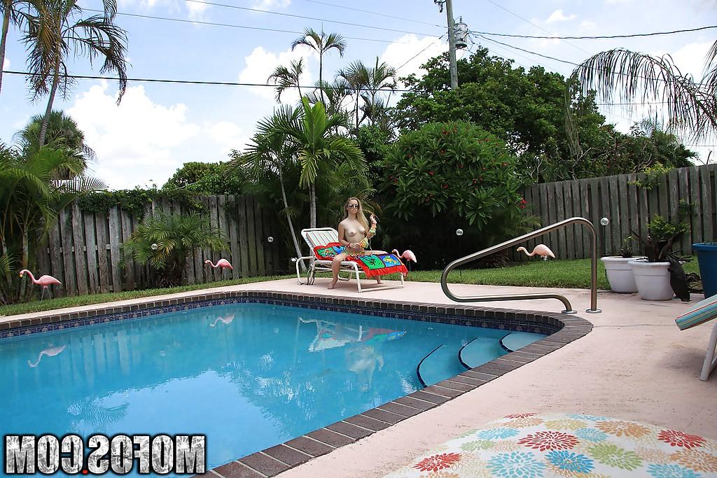 16P Pretty amateur babe Madison Chandler stripping by the pool