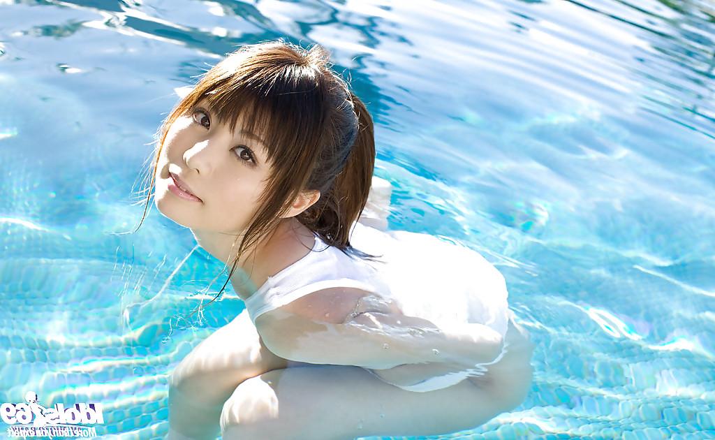 15P Petite asian coed with nice tits Aya Hirai stripping by the pool
