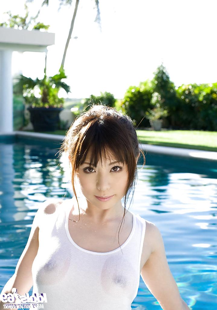 15P Petite asian coed with nice tits Aya Hirai stripping by the pool