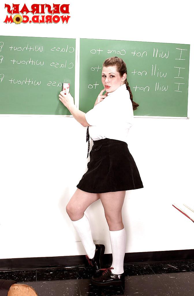 16P Busty babe Desirae loosing big pornstar tits from schoolgirl uniform
