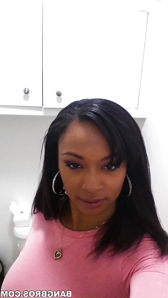 14P Curvy black chick Porsha Carrera taking selfies of her big black tits