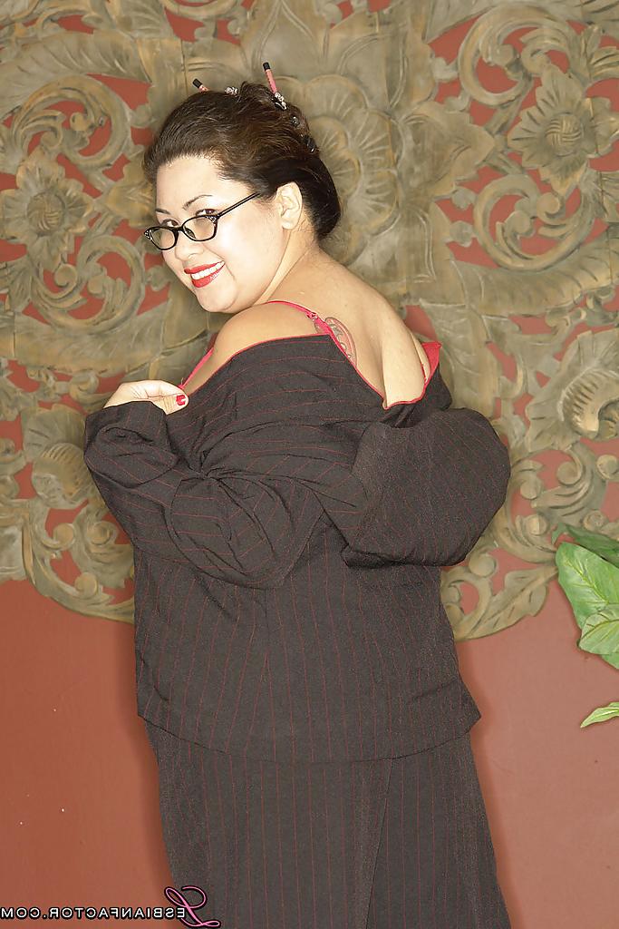 16P Naughty asian plumper in glasses uncovering her big flabby tits