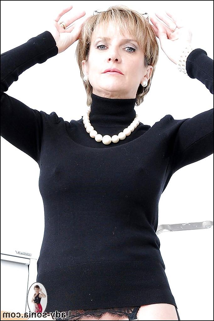 15P Clothed mature Lady Sonia shows her stunning big natural boobies