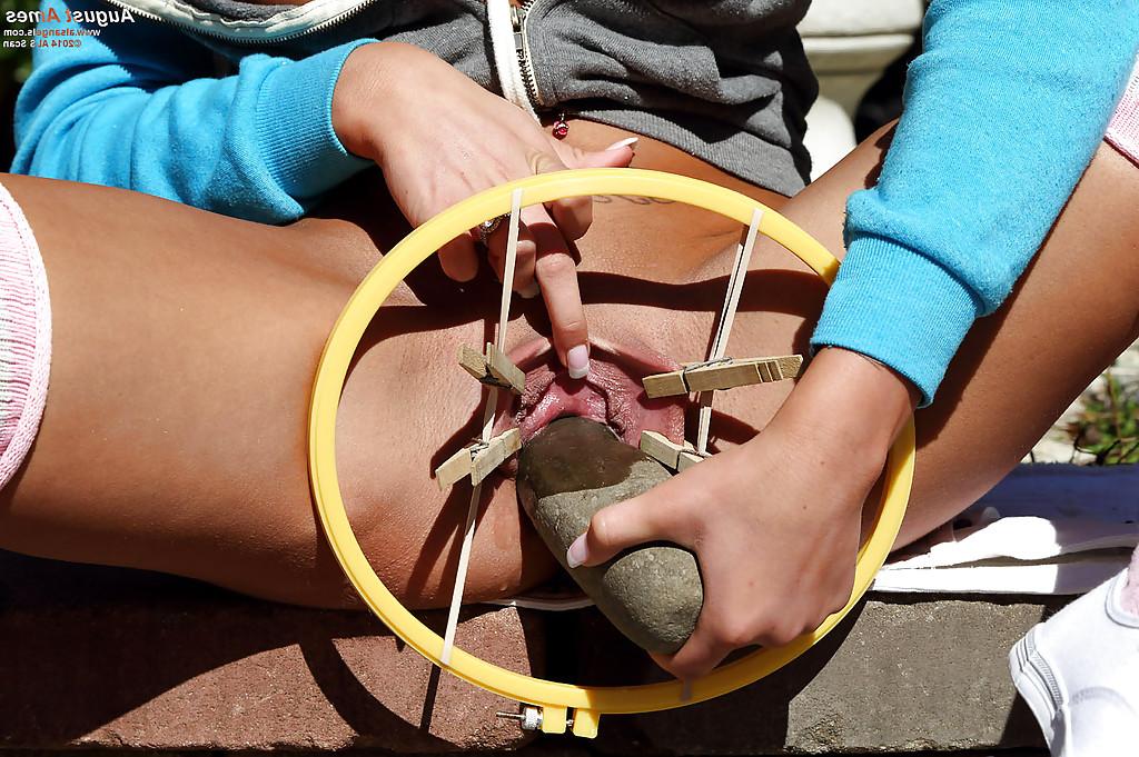 15P Stunning cutie August Ames is banging her puss with a stone!