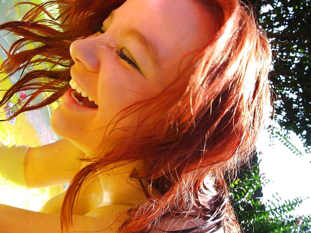 25P Sizzling Hot Busty Redhead in Bikini Pool