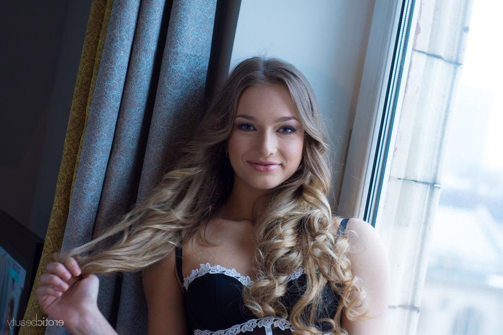 16P Beautiful blonde teen Amy Moore gets inspired to strip while reading a good book