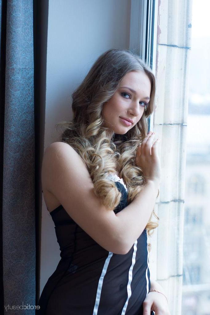 16P Beautiful blonde teen Amy Moore gets inspired to strip while reading a good book