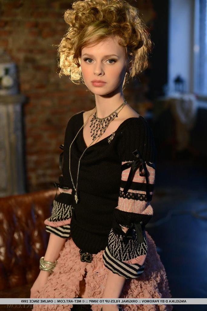 18P Blonde beauty Angelika D gives you a sexy victorian striptease