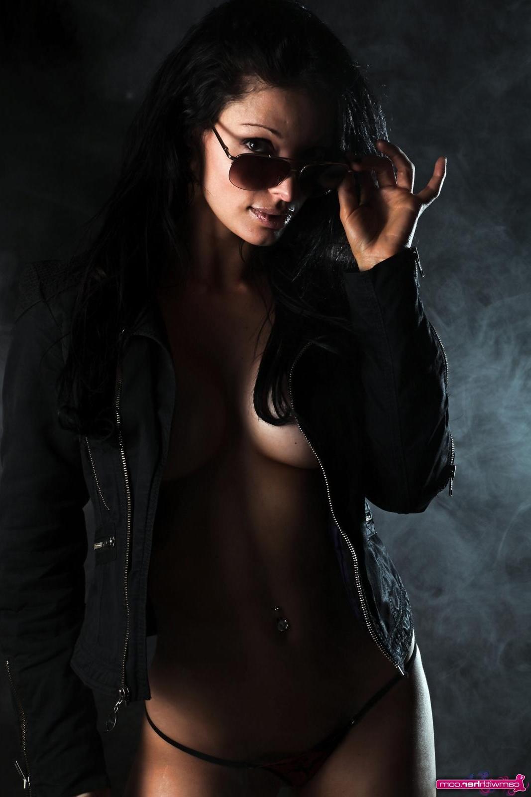 12P Busty babe Angelina Stevens poses behind a curtain of smoke