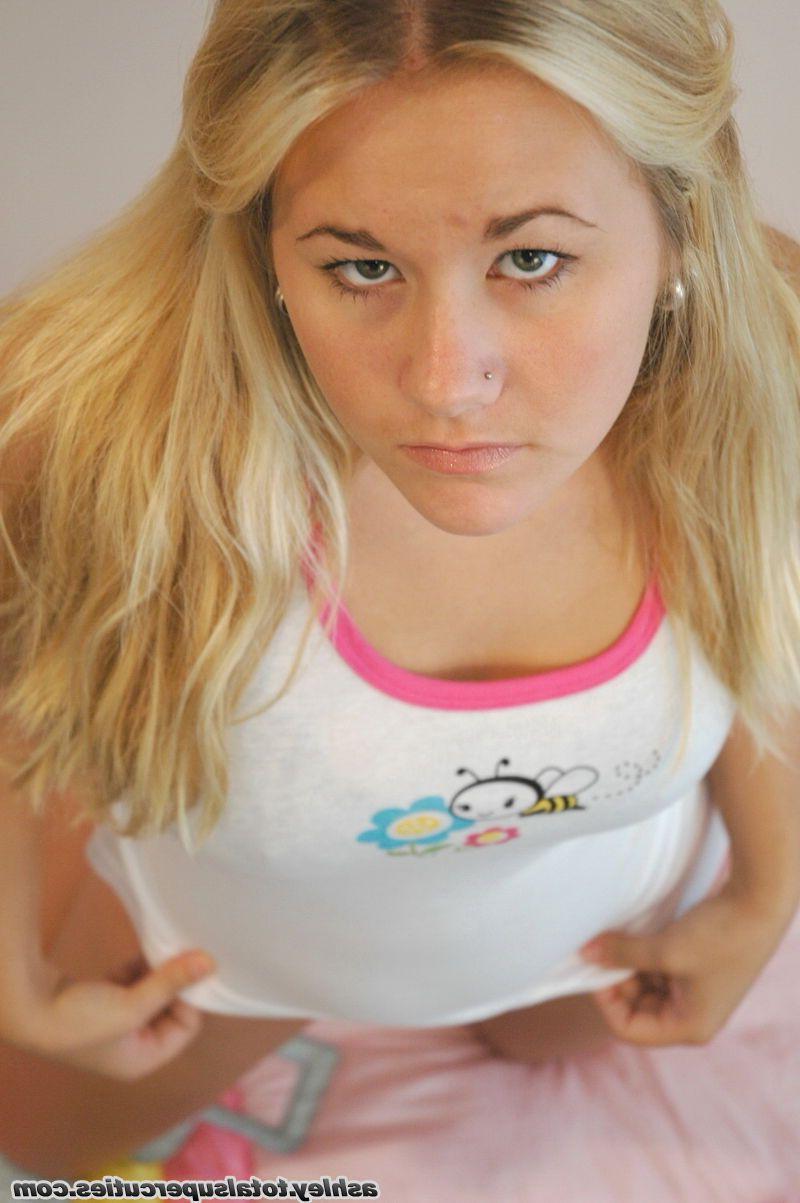 20P Pictures of teen cutie Ashley teasing in panties and a tight shirt