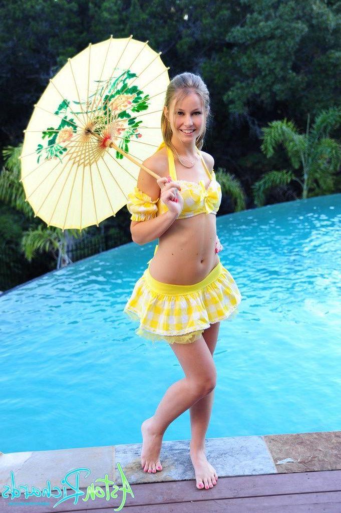 20P Pictures of Aston Richards showing her titties by the pool