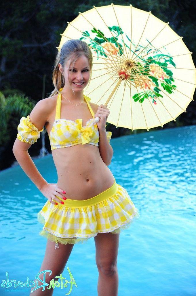 20P Pictures of Aston Richards showing her titties by the pool