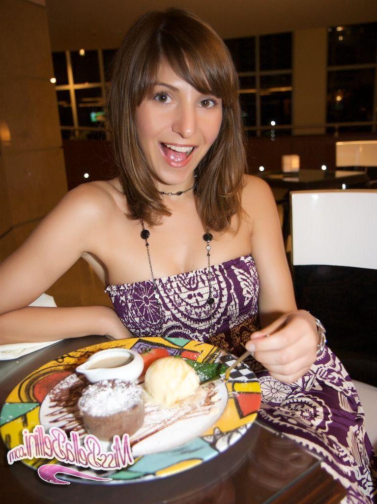 15P Pictures of Bella Bellini lifting her skirt to show her panties