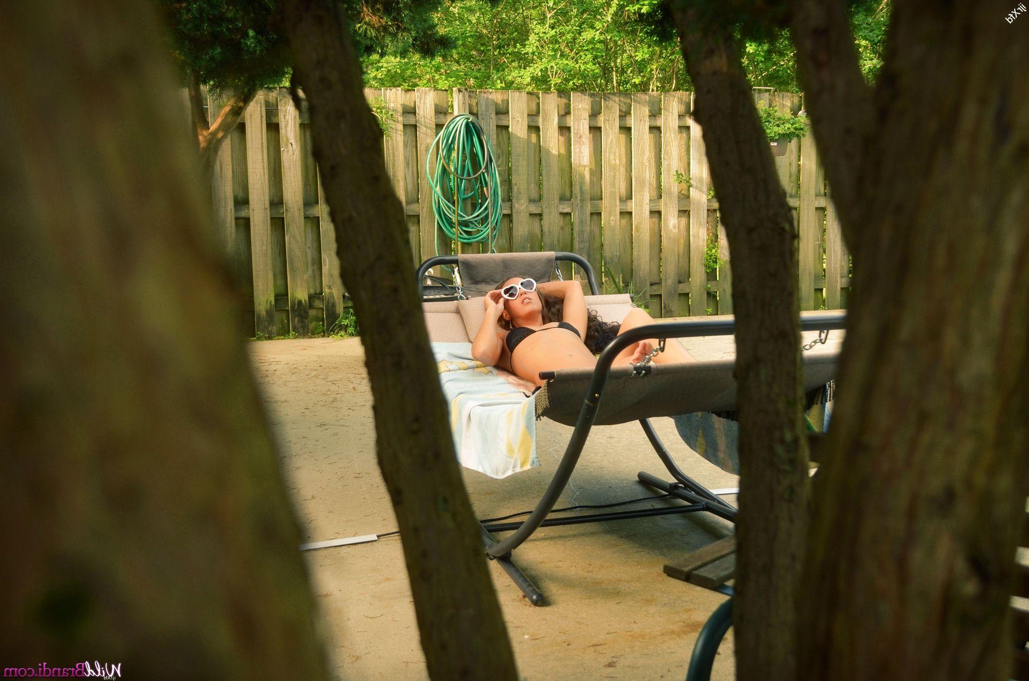 12P Wild Brandi shows off her hot body while sun tanning