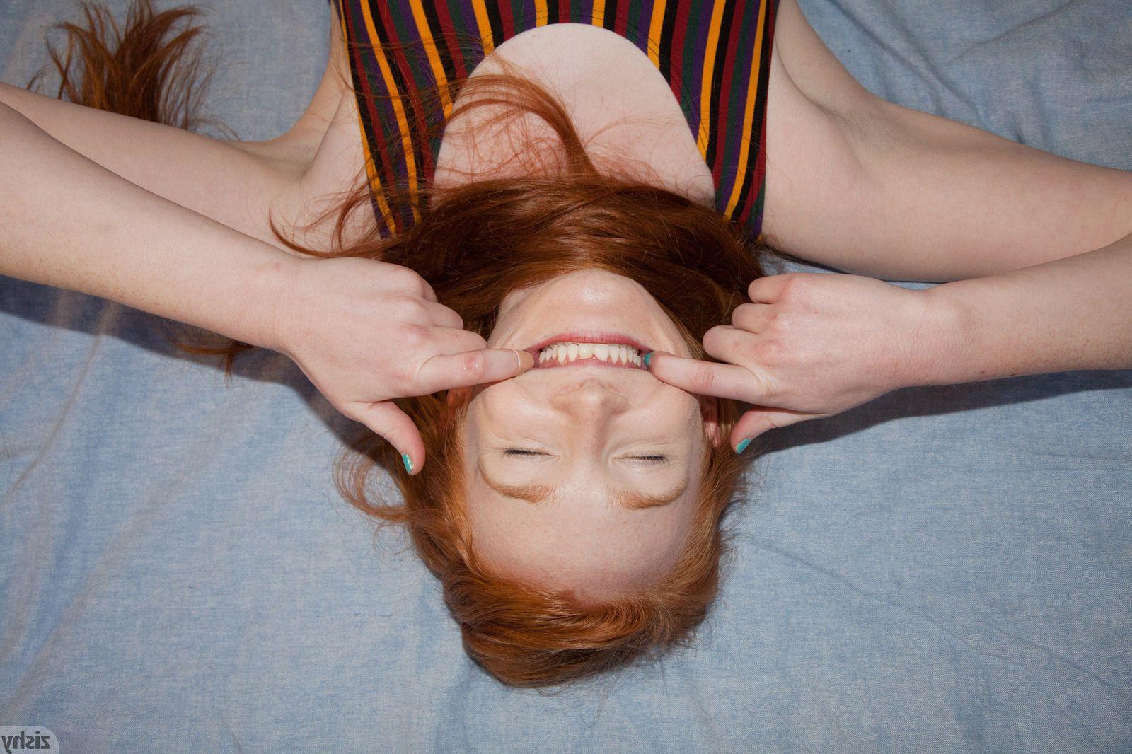 12P Redhead girl Bree Abernathy has fun at home with her banana
