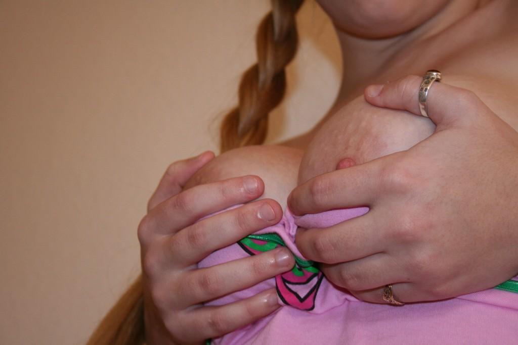 16P Pictures of teen girl Busty Barbi letting her big natural boobs hang loose