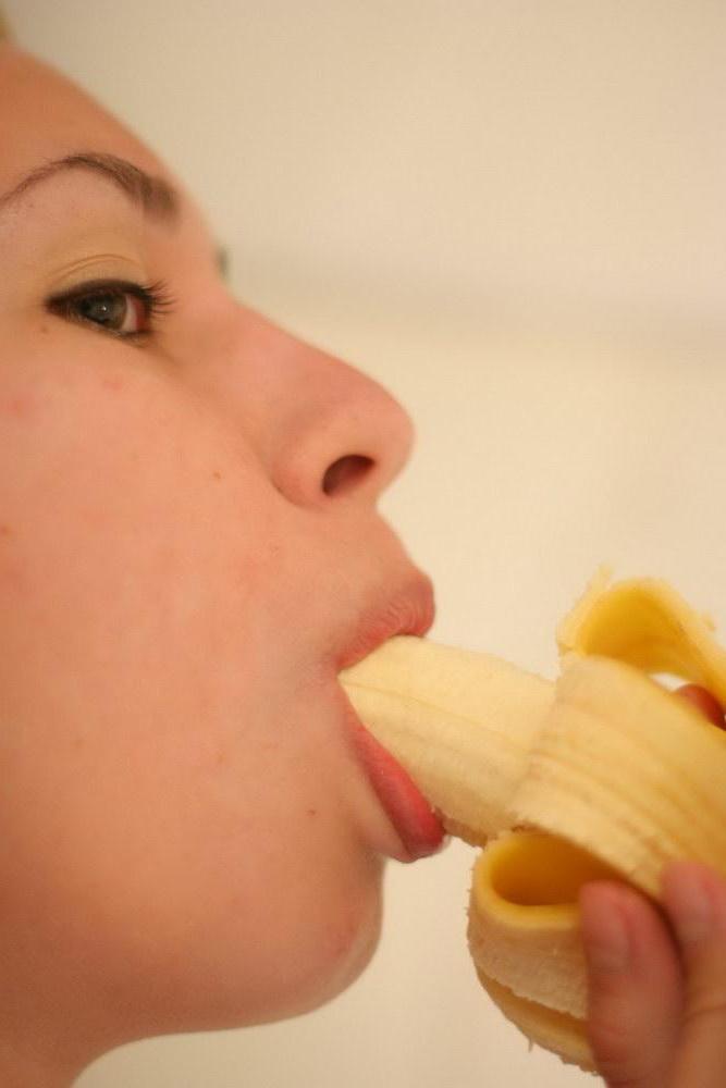 15P Pictures of Busty Nastya eating a banana