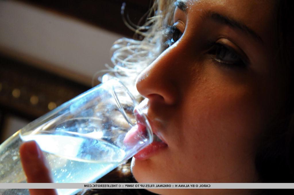 16P Brunette pinup girl Carol O pleasures her pussy with a wine bottle