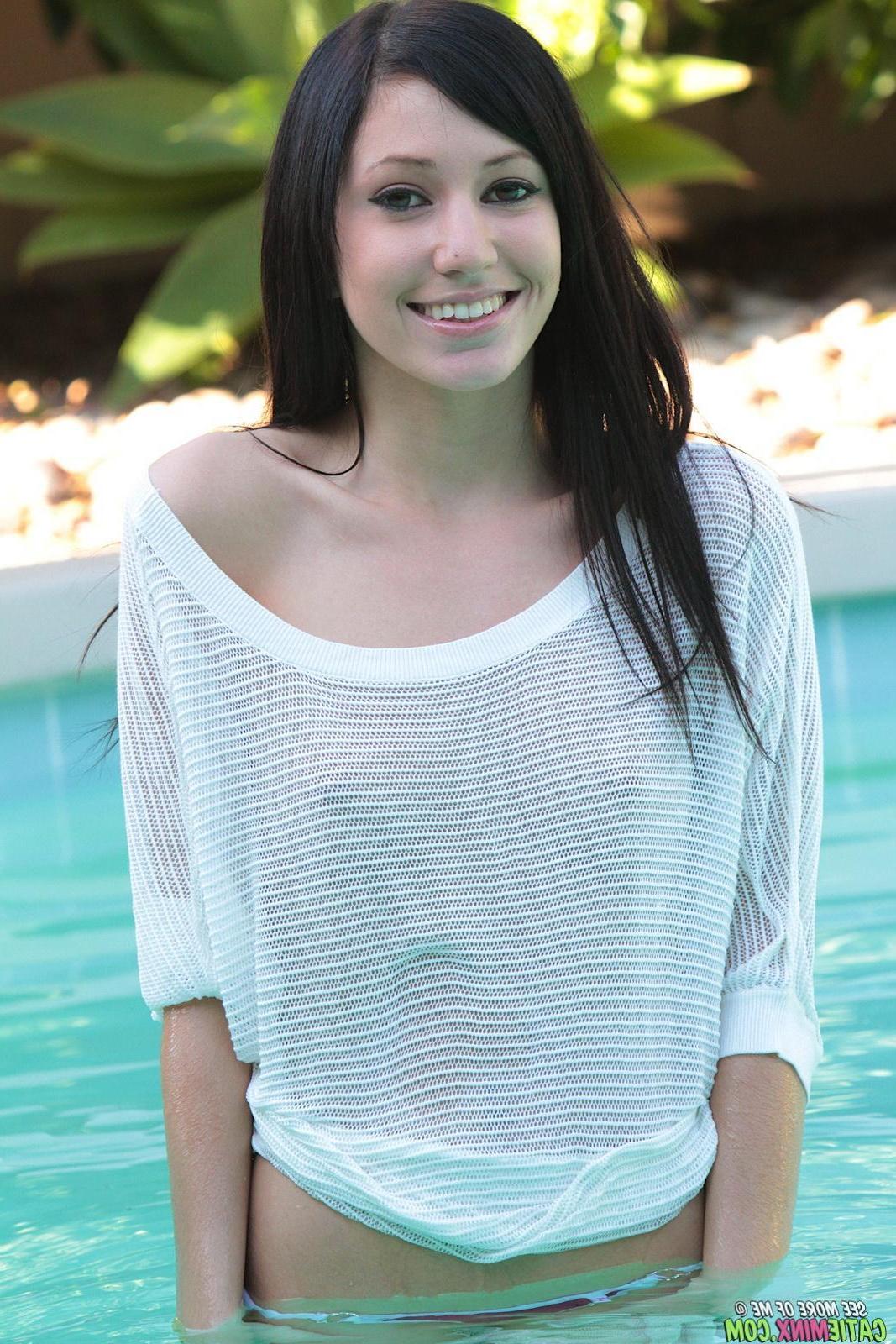 15P Catie Minx is so transparent as she wets her pool coverup to show you her pretty titties