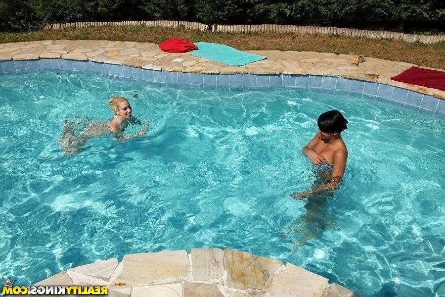 20P Hot euro teens Nesty and Coco enjoy a steamy sex party by the pool