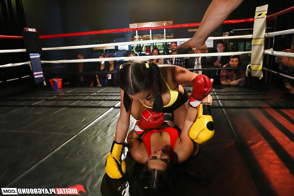 16P Brunette female boxers Eva Lovia and Peta Jensen have 3some in ring