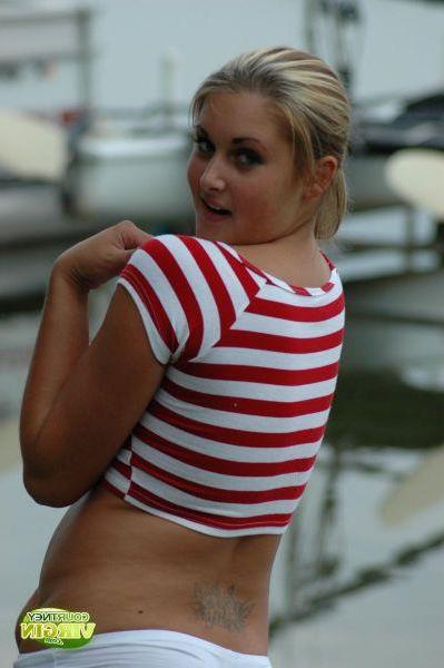 16P Pictures of Courtney Virgin flashing her big natural tits outside