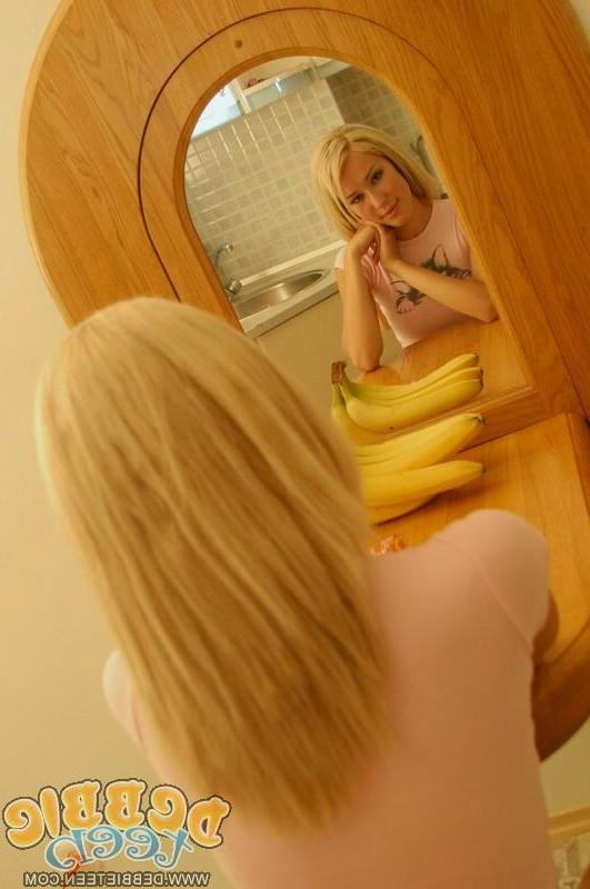 20P Pictures of Debbie Teen sucking on a lolipop