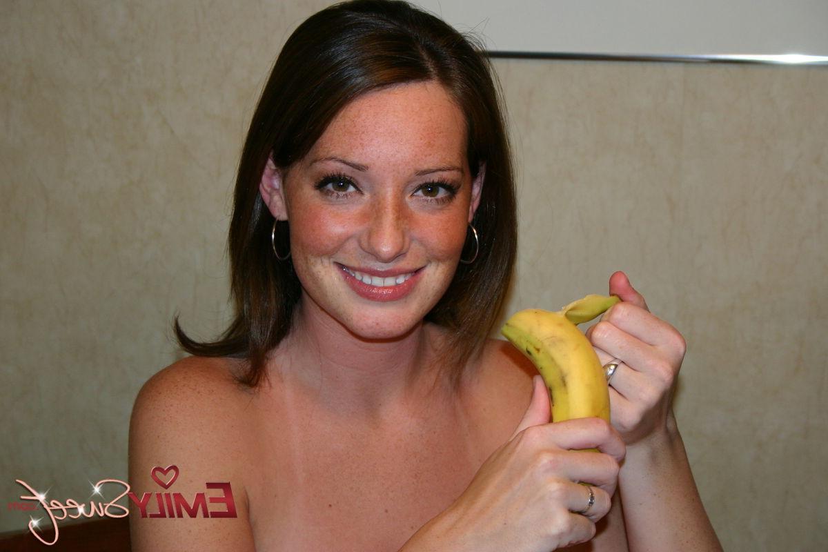 20P Pictures of Emily Sweet eating a banana