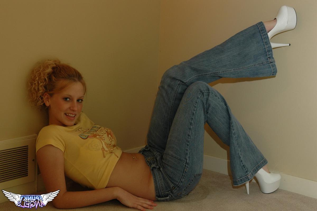 20P Redhead teen Lucky strips out of her blue jeans just for you