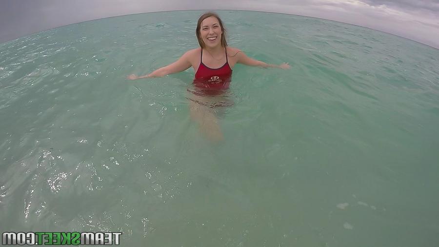 16P Teen babe Kimber Lee flashing large natural tits in the ocean