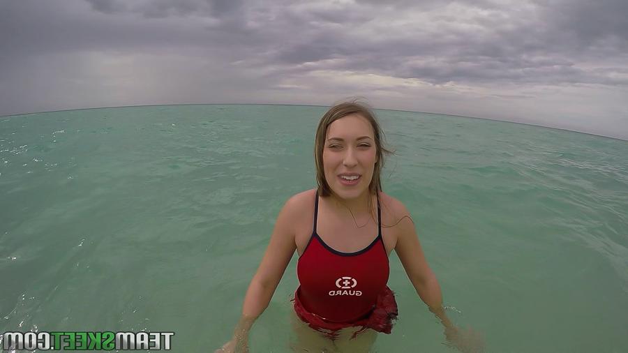 16P Teen babe Kimber Lee flashing large natural tits in the ocean
