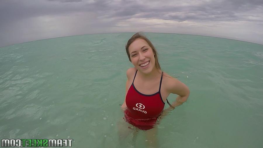 16P Teen babe Kimber Lee flashing large natural tits in the ocean