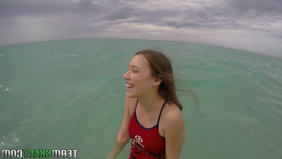 16P Teen babe Kimber Lee flashing large natural tits in the ocean