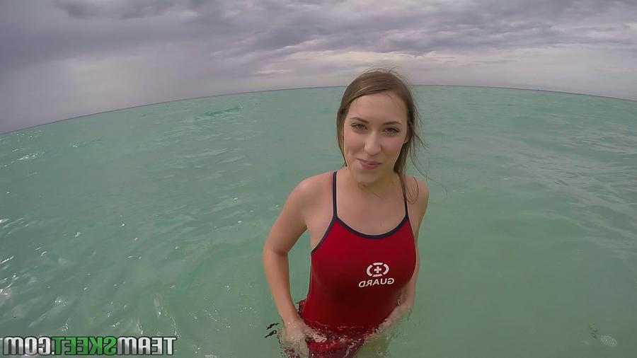16P Teen babe Kimber Lee flashing large natural tits in the ocean