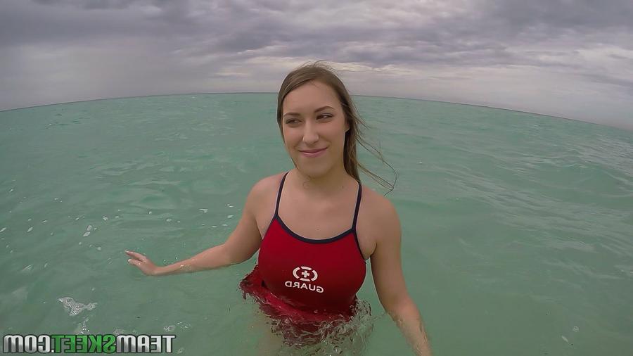 16P Teen babe Kimber Lee flashing large natural tits in the ocean