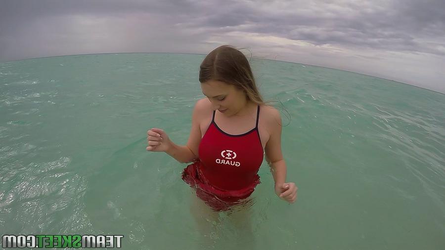 16P Teen babe Kimber Lee flashing large natural tits in the ocean